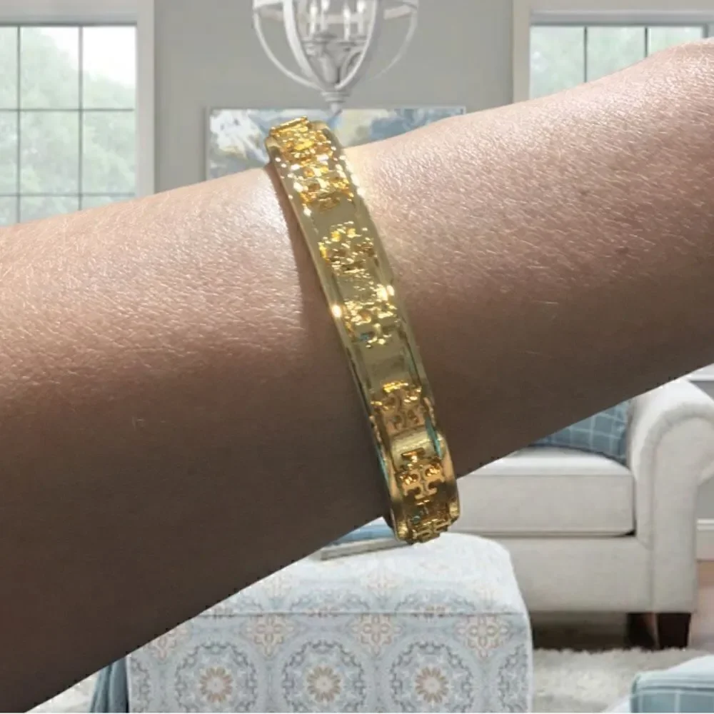 TORY BURCH RAISE LOGO STUDDED 18k GOLD PLATED BRACELET